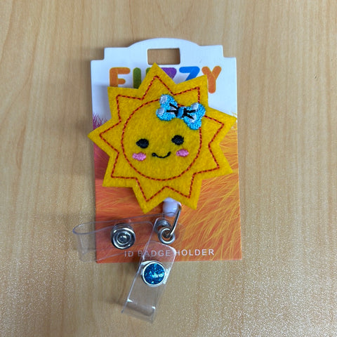 Sun Fuzzy Buddy Badge Reel